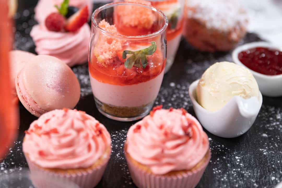 Strawberry & white chocolate cheesecake shot glass at the centre of attention