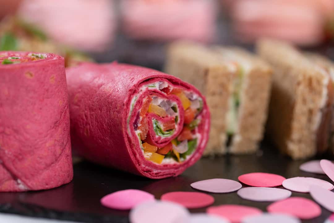 smoked salmon sandwich and Beetroot tortilla wrap display